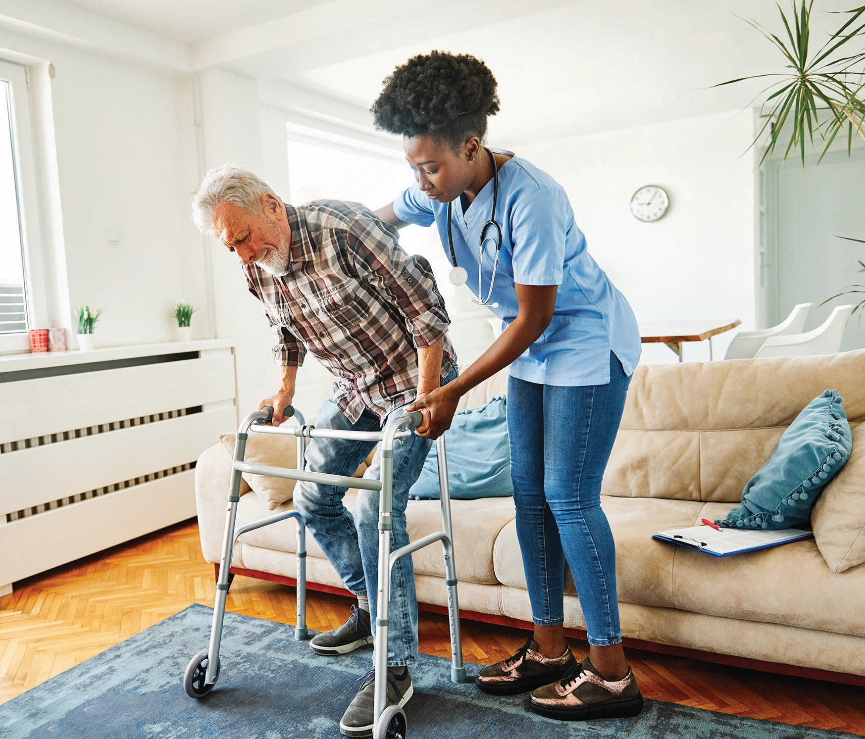 A caregiver offering a reassuring presence to a senior